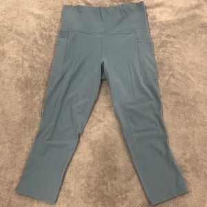 Athleta Salutation Stash Pocket II 7/8 Tight Leggings Women Size Small Soft Teal